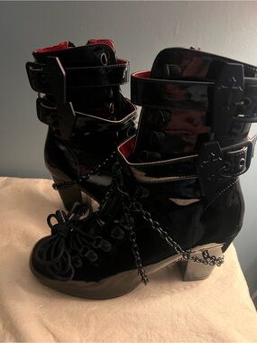 Demonia Women’s Black Patent Chain-Accent Ankle Boots